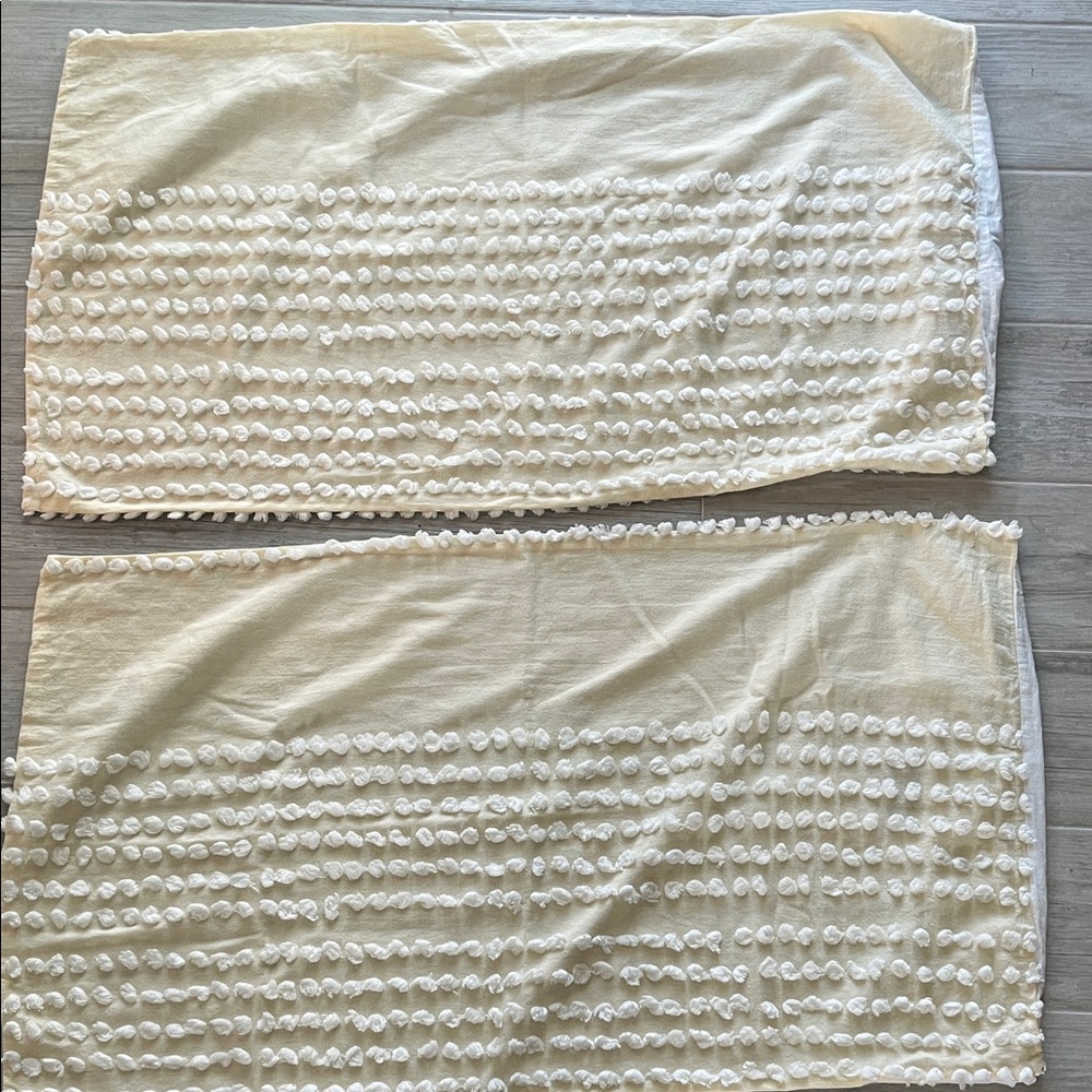 The pure collection by Indigo 2 pom pom textured pillow cases yellow white 19x36